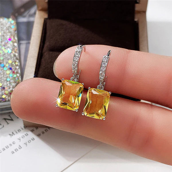 Silver Plated Anti Tarnish Yellow Rectangular American Diamond Studded Crushed Ice Cut Drop Earrings