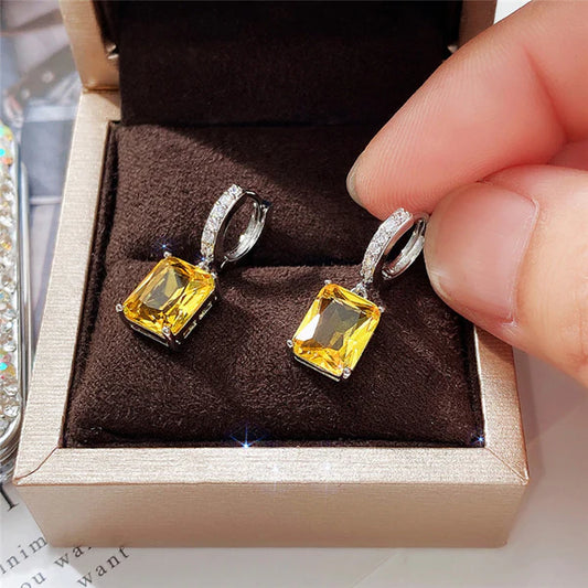Silver Plated Anti Tarnish Yellow Rectangular American Diamond Studded Crushed Ice Cut Drop Earrings