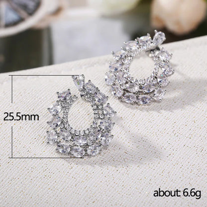 Silver Plated Anti Tarnish American Diamond Studded Contemporary Teardrop Earrings