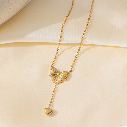 Gold Plated Stainless Steel Anti Tarnish Heart Themed Bow inspired Pendant Necklace