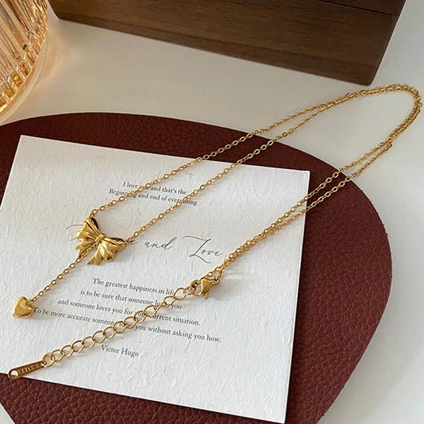 Gold Plated Stainless Steel Anti Tarnish Heart Themed Bow inspired Pendant Necklace - Aurvi