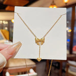 Gold Plated Stainless Steel Anti Tarnish Heart Themed Bow inspired Pendant Necklace - Aurvi