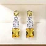 Silver Plated American Diamond Studded Yellow Geometrical Crushed Ice Cut Drop Earrings - Aurvi