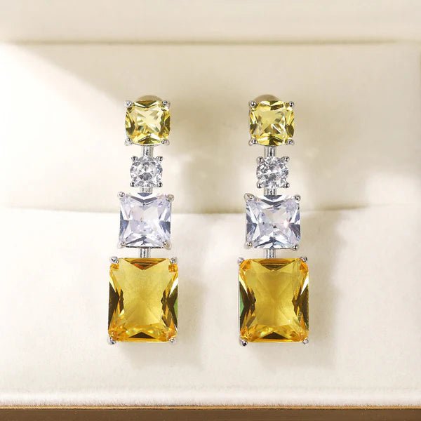 Silver Plated American Diamond Studded Yellow Geometrical Crushed Ice Cut Drop Earrings - Aurvi