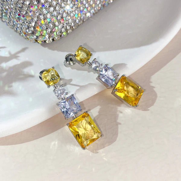 Silver Plated American Diamond Studded Yellow Geometrical Crushed Ice Cut Drop Earrings - Aurvi